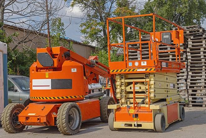 forklift transporting goods in a busy warehouse setting in Cut and Shoot TX